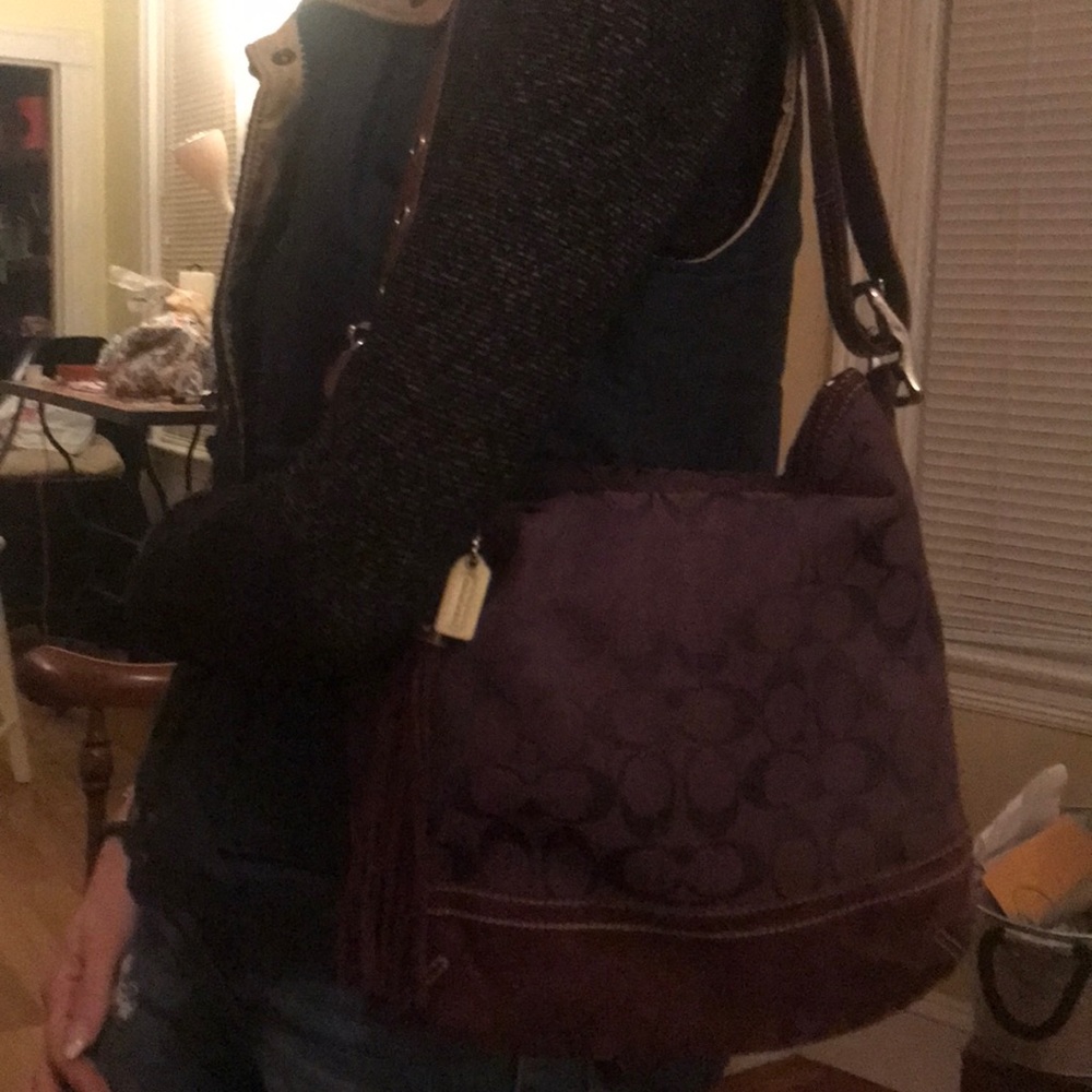 Coach deep purple in great condition